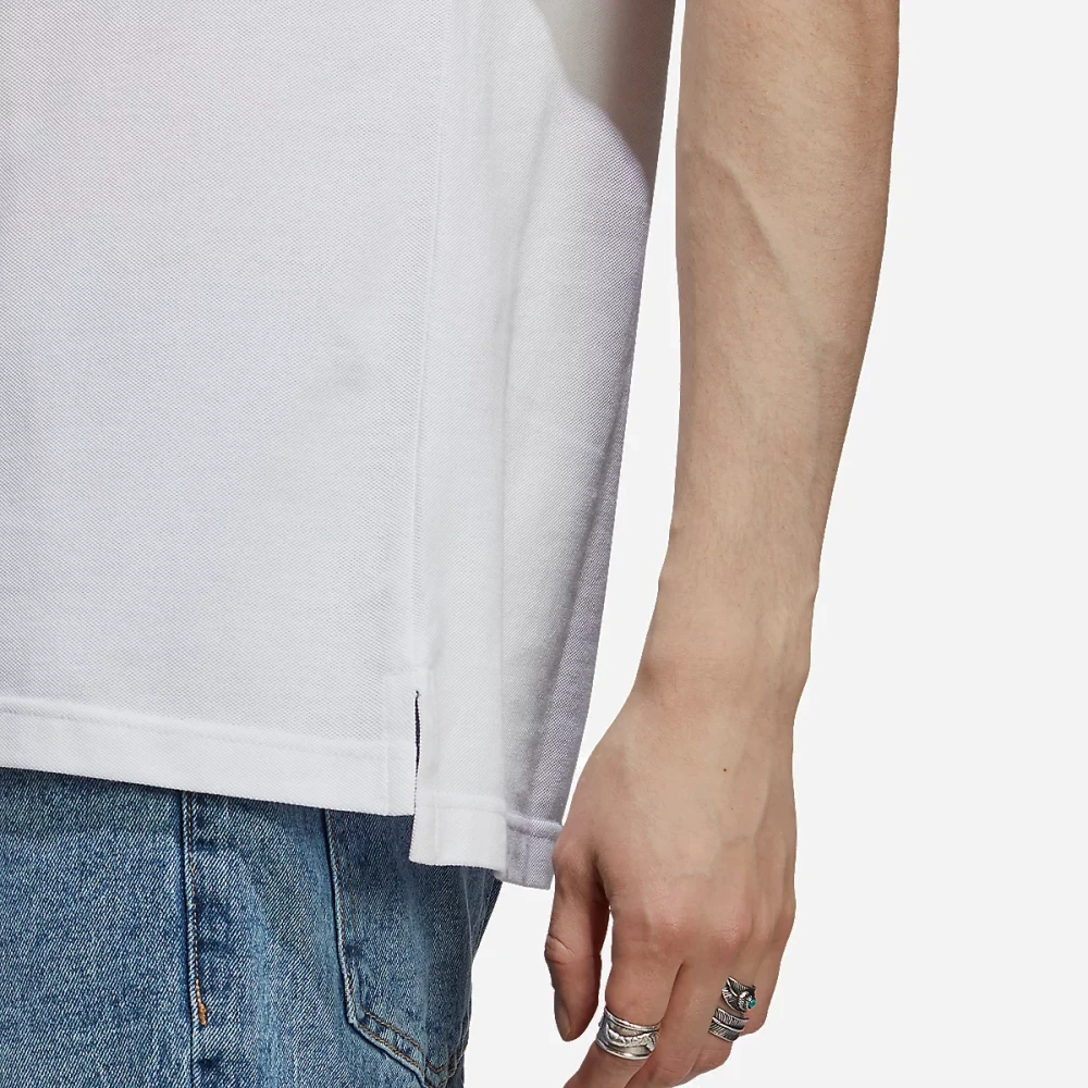 Polo à manches courtes homme petit logo et 3 bandes en piqué brodé Essentials Blanc