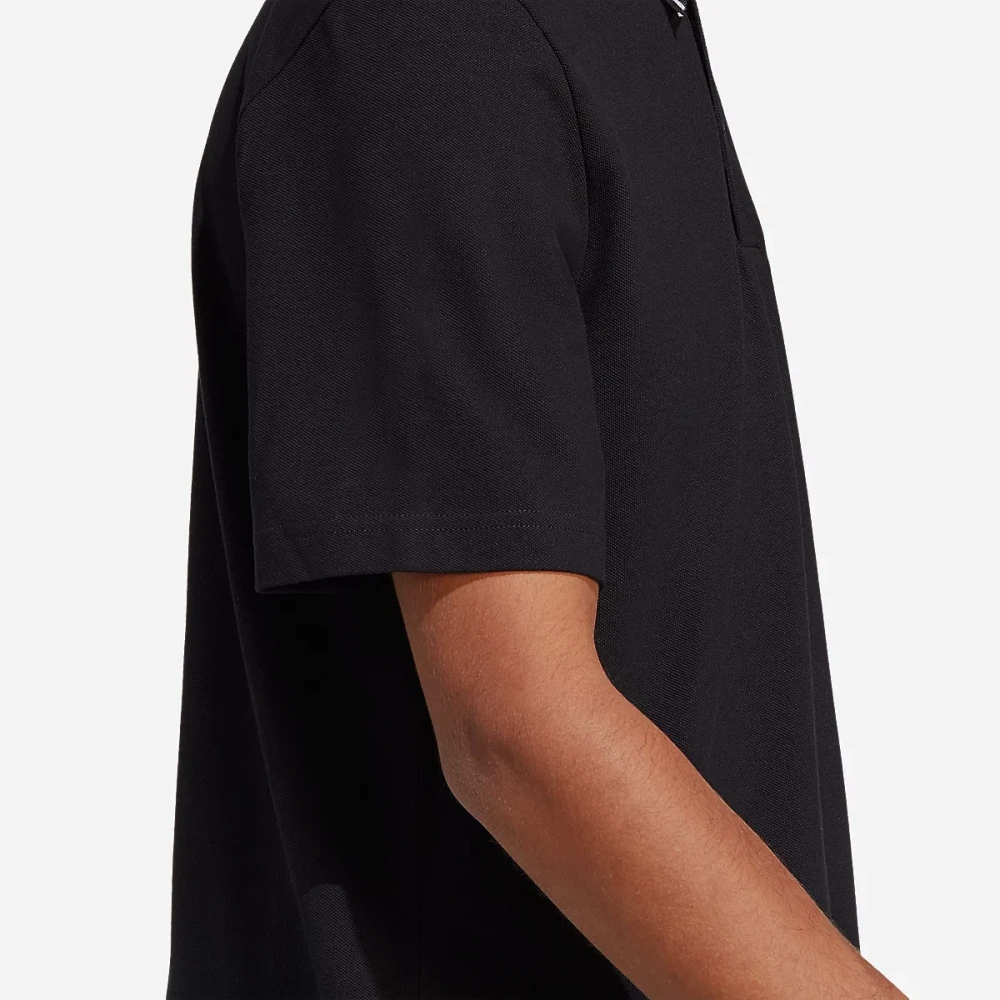 Polo à manches courtes homme petit logo en piqué Essentials